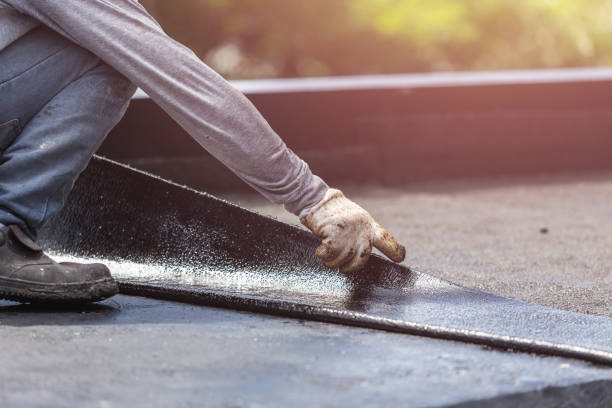 Professional Waterproofing technician working in Naples, NY